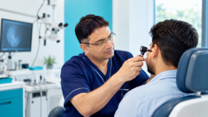 ENT doctor examining a patient during an ENT consultation